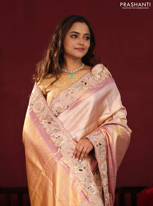 Golden tissue kanchipuram silk saree with allover zari weaves & border embroidery