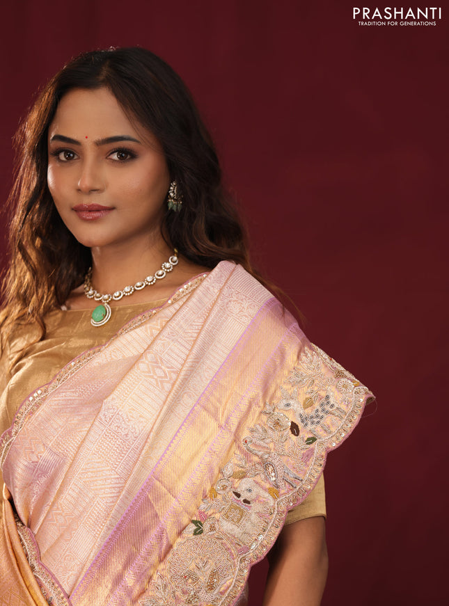 Golden tissue kanchipuram silk saree with allover zari weaves & border embroidery