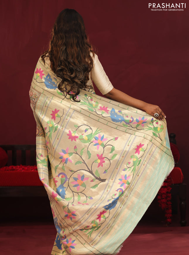 Pista green banarasi organza silk saree with paithani style border & embroidery