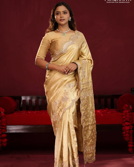 Gold pure kanchipuram tissue silk saree with embroidery border & pallu