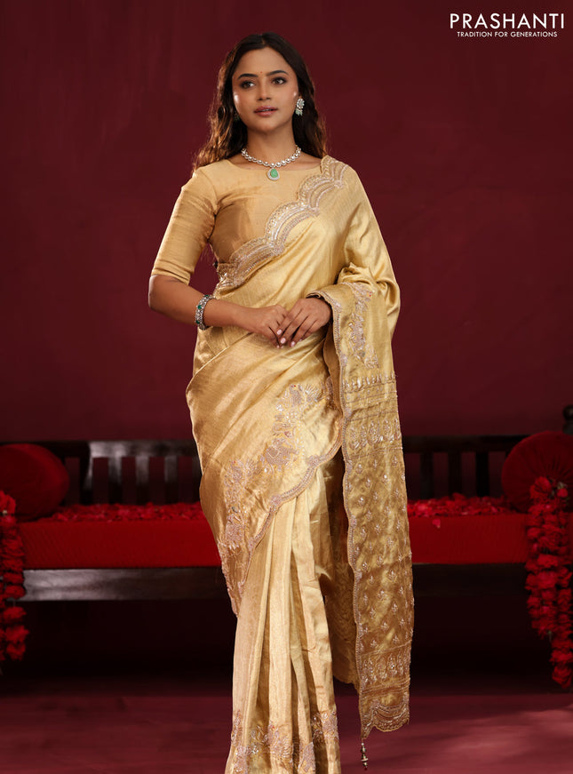 Gold pure kanchipuram tissue silk saree with embroidery border & pallu