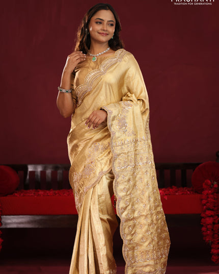 Gold pure kanchipuram tissue silk saree with embroidery border & pallu