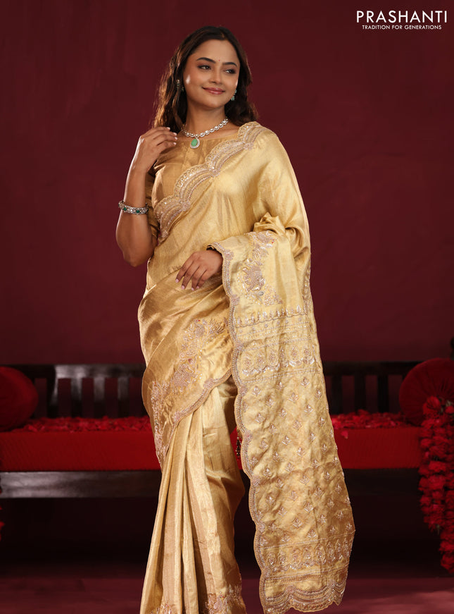 Gold pure kanchipuram tissue silk saree with embroidery border & pallu