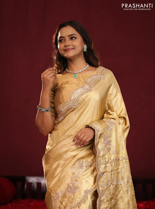 Gold pure kanchipuram tissue silk saree with embroidery border & pallu