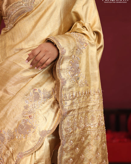 Gold pure kanchipuram tissue silk saree with embroidery border & pallu