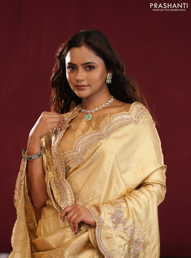 Gold pure kanchipuram tissue silk saree with embroidery border & pallu