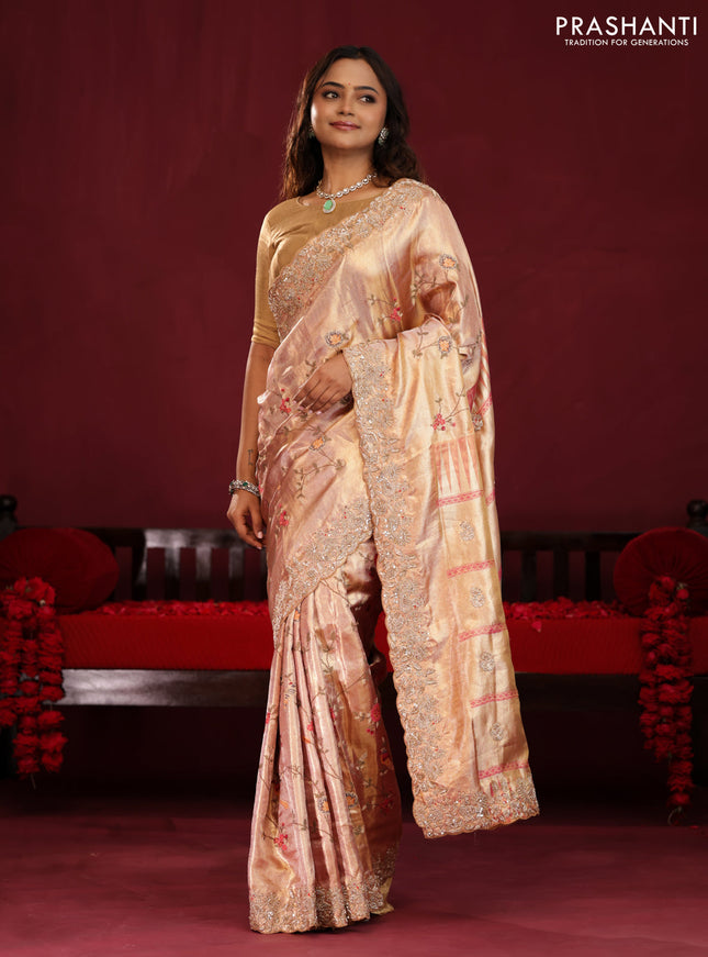 Pastel pink pure kanchipuram tissue silk saree with allover embroidery