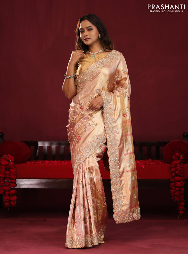 Pastel pink pure kanchipuram tissue silk saree with allover embroidery