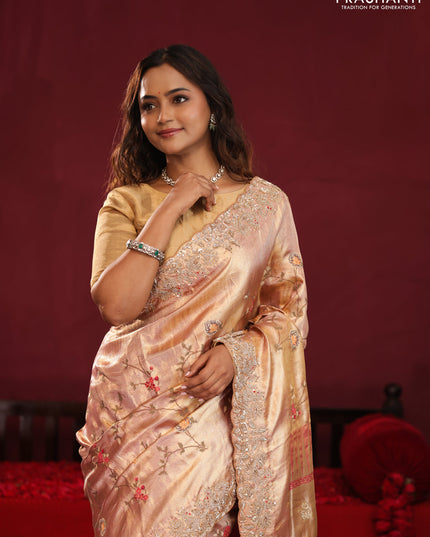 Pastel pink pure kanchipuram tissue silk saree with allover embroidery