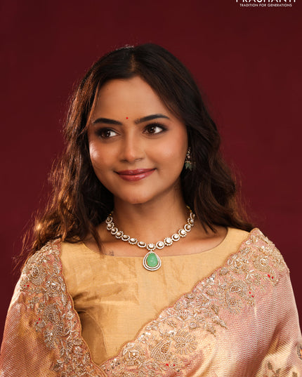 Pastel pink pure kanchipuram tissue silk saree with allover embroidery