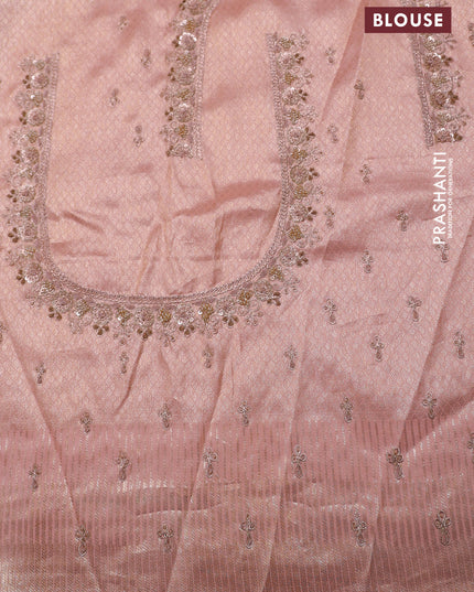 Pastel pink pure kanchipuram silk saree with allover weaves & border embroidery