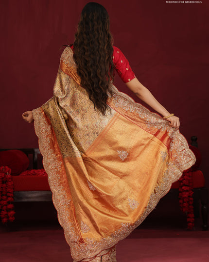 Gold & Red pure kanchipuram tissue silk saree with allover mina weaves & embroidery