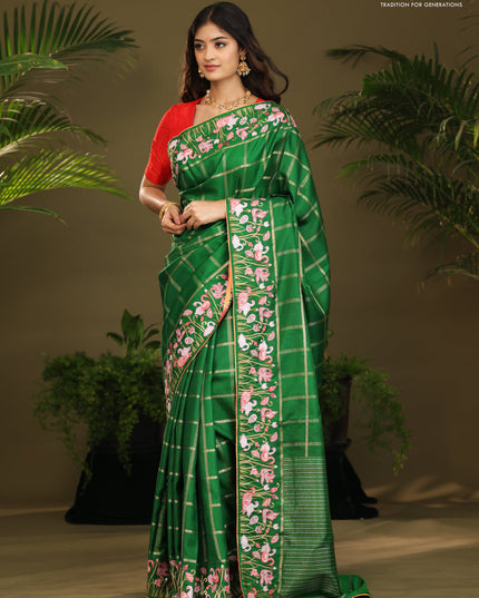 Green kanchipuram silk saree with allover zari checks & border embroidery