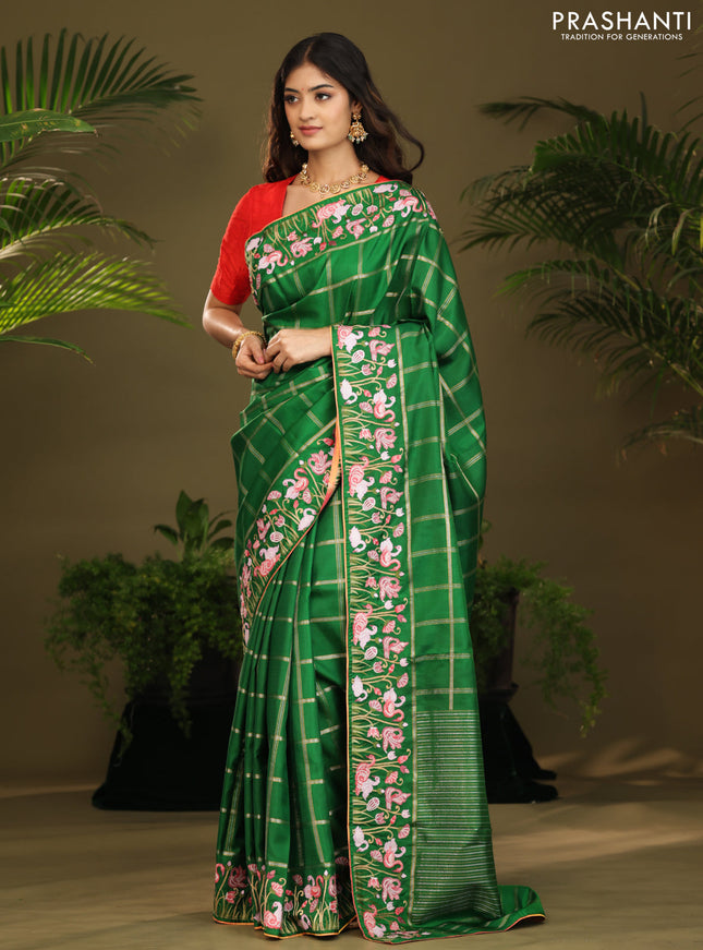 Green kanchipuram silk saree with allover zari checks & border embroidery