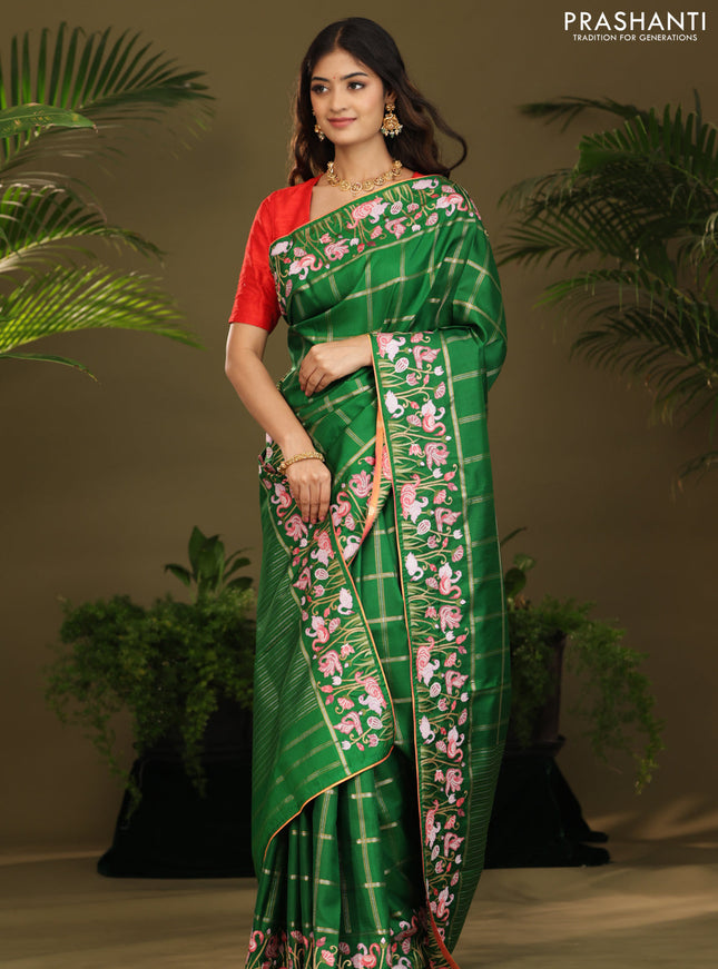 Green kanchipuram silk saree with allover zari checks & border embroidery