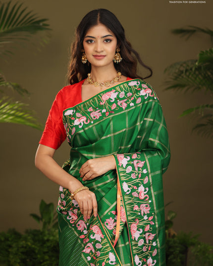 Green kanchipuram silk saree with allover zari checks & border embroidery