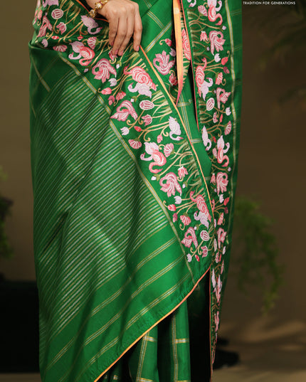 Green kanchipuram silk saree with allover zari checks & border embroidery