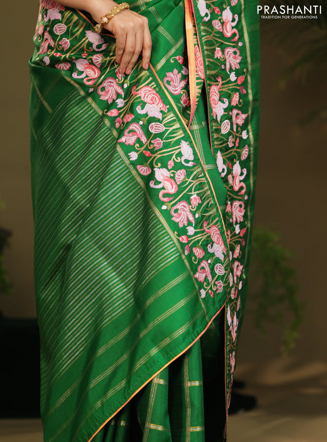 Green kanchipuram silk saree with allover zari checks & border embroidery