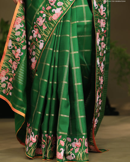 Green kanchipuram silk saree with allover zari checks & border embroidery