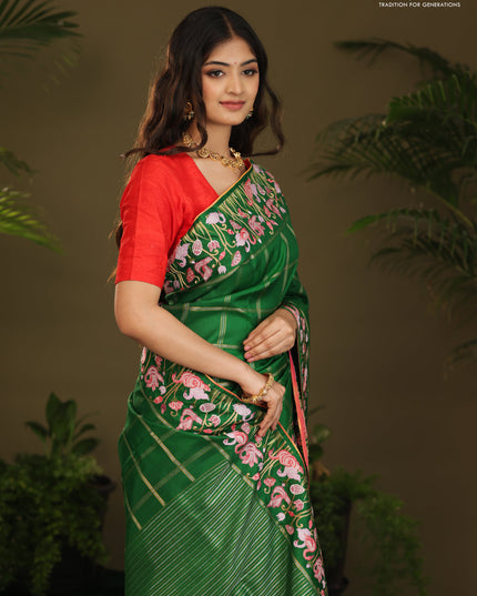 Green kanchipuram silk saree with allover zari checks & border embroidery