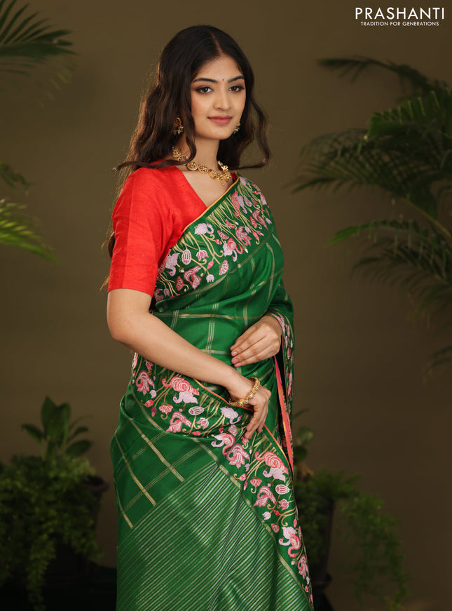 Green kanchipuram silk saree with allover zari checks & border embroidery