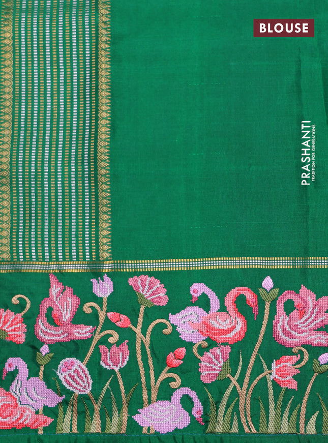 Green kanchipuram silk saree with allover zari checks & border embroidery