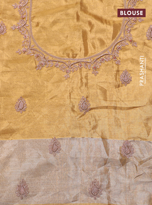 Gold Pure kanchipuram tissue silk saree with allover zari weaves & embroidery