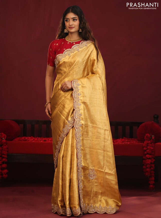 Golden tissue kanchipuram silk saree with allover brocade zari weaves & border embroidery
