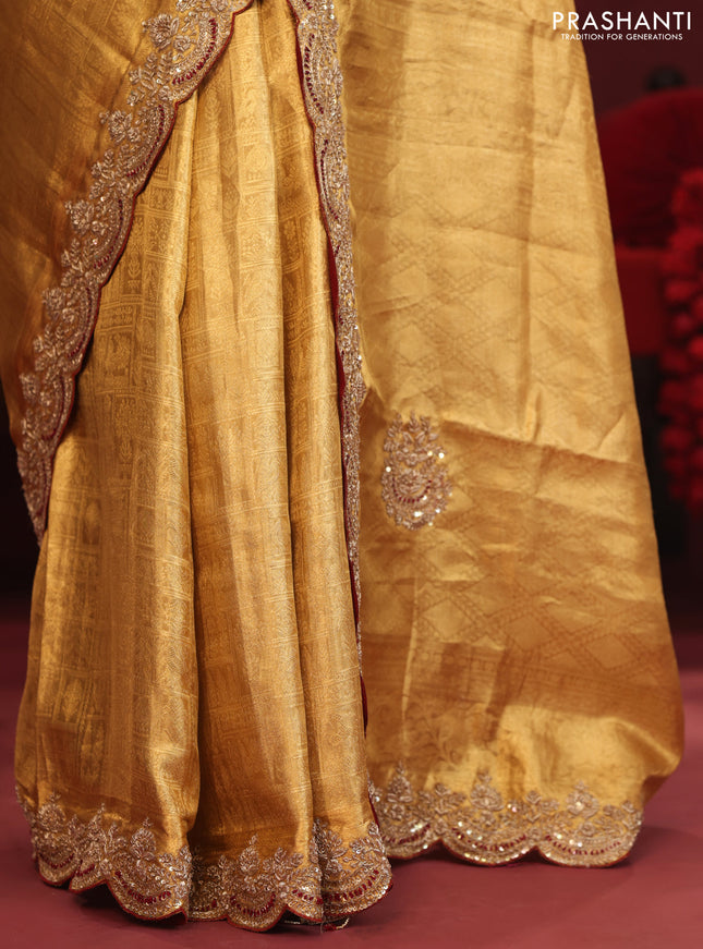 Golden tissue kanchipuram silk saree with allover brocade zari weaves & border embroidery