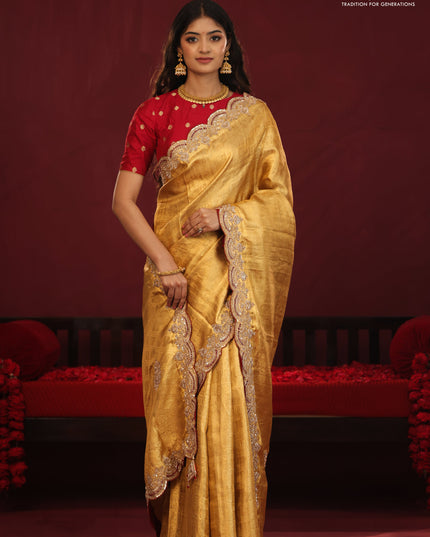 Golden tissue kanchipuram silk saree with allover brocade zari weaves & border embroidery