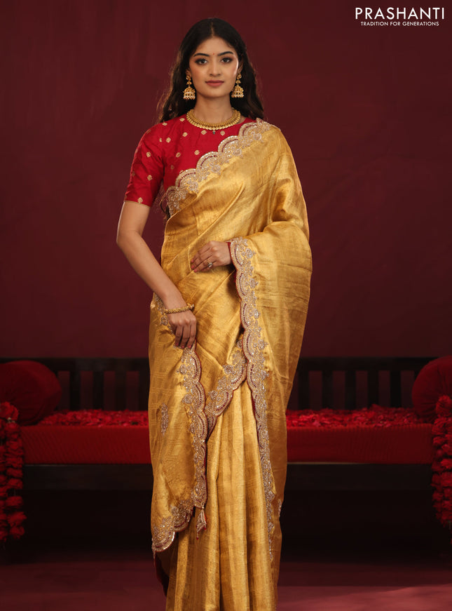 Golden tissue kanchipuram silk saree with allover brocade zari weaves & border embroidery