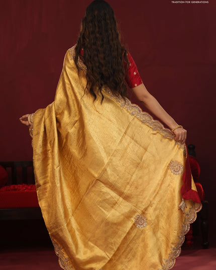 Golden tissue kanchipuram silk saree with allover brocade zari weaves & border embroidery