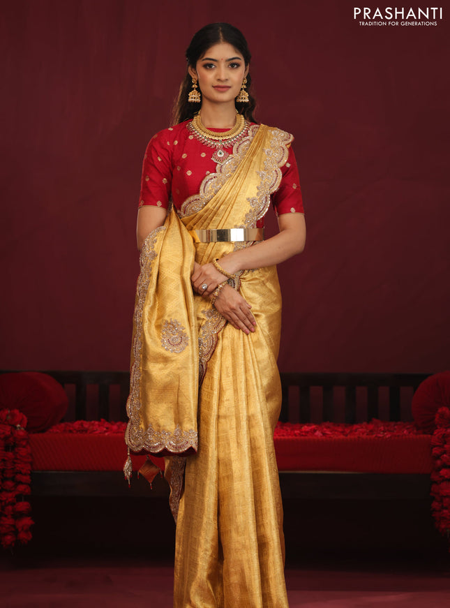 Golden tissue kanchipuram silk saree with allover brocade zari weaves & border embroidery