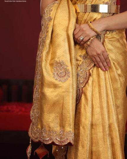 Golden tissue kanchipuram silk saree with allover brocade zari weaves & border embroidery