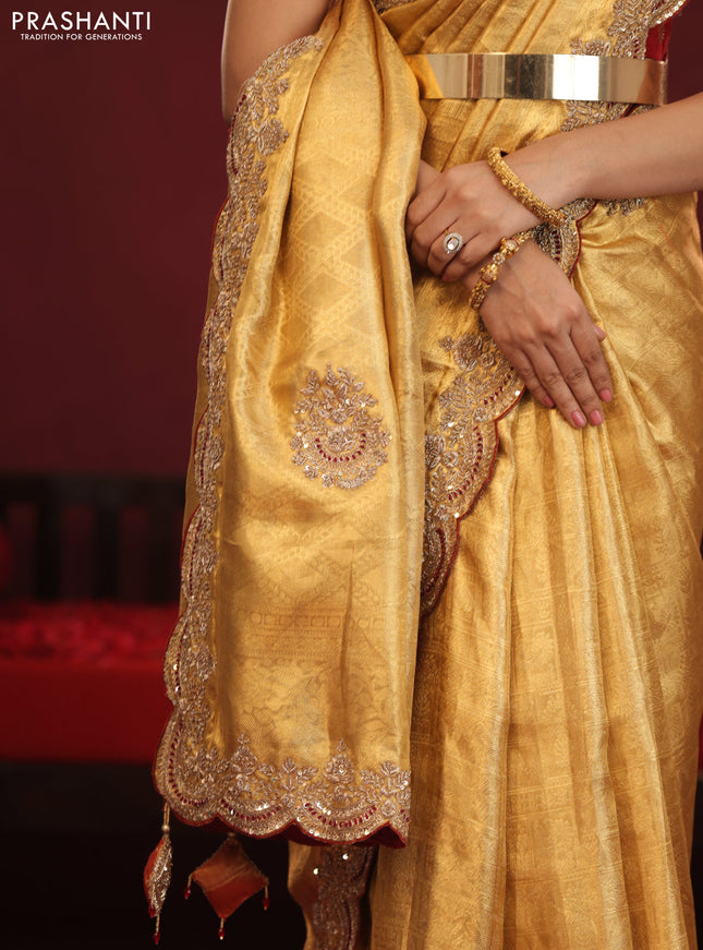Golden tissue kanchipuram silk saree with allover brocade zari weaves & border embroidery