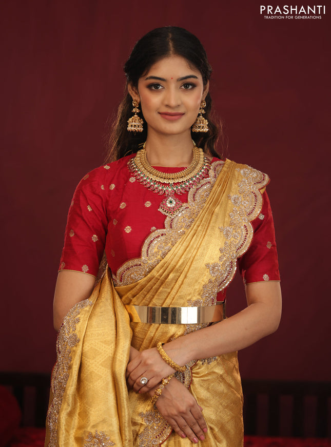 Golden tissue kanchipuram silk saree with allover brocade zari weaves & border embroidery