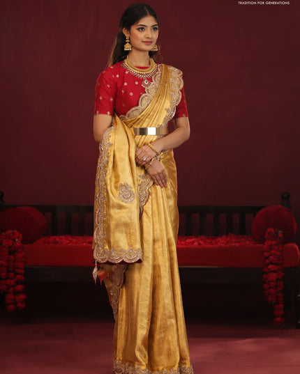 Golden tissue kanchipuram silk saree with allover brocade zari weaves & border embroidery