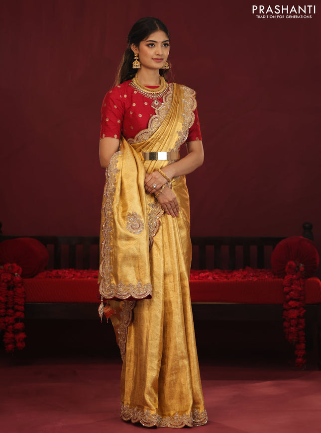 Golden tissue kanchipuram silk saree with allover brocade zari weaves & border embroidery
