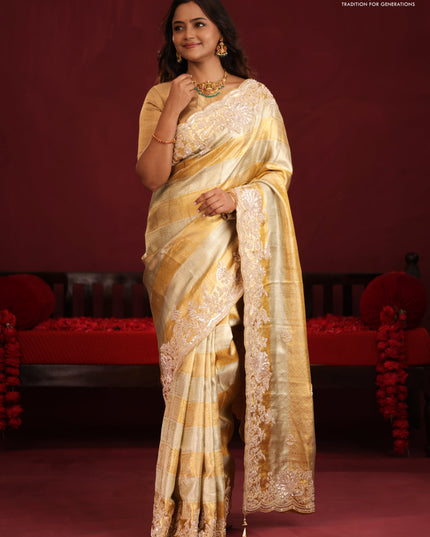 Pure tissue kanchipuram silk saree with allover zari weaves & border embroidery