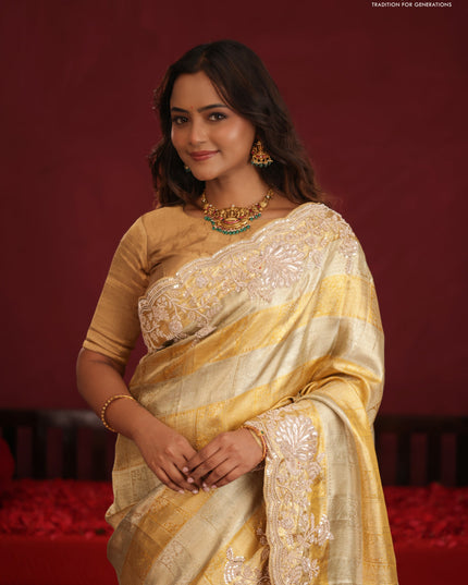 Pure tissue kanchipuram silk saree with allover zari weaves & border embroidery