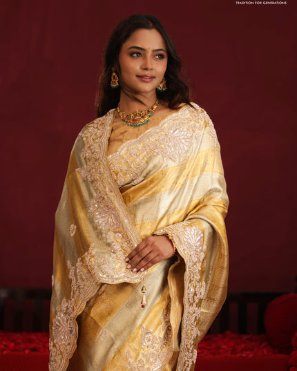 Pure tissue kanchipuram silk saree with allover zari weaves & border embroidery