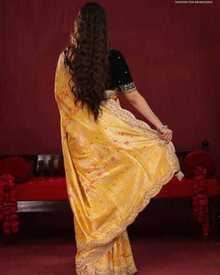 Yellow banarasi uppada silk saree with allover mina weaves & border embroidery