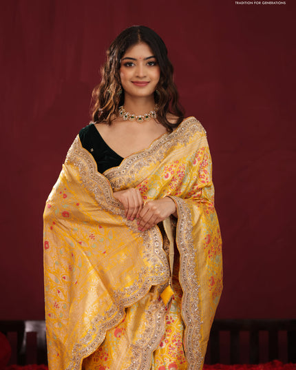 Yellow banarasi uppada silk saree with allover mina weaves & border embroidery