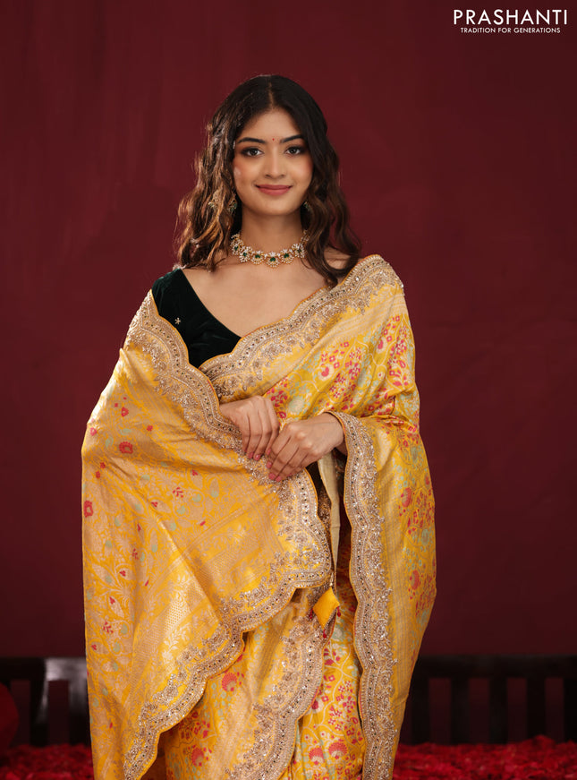 Yellow banarasi uppada silk saree with allover mina weaves & border embroidery