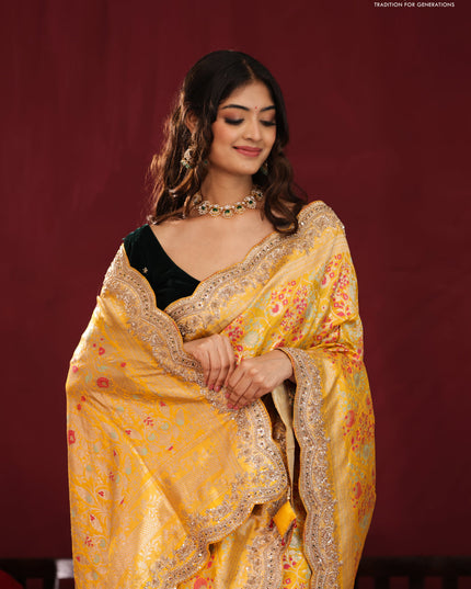 Yellow banarasi uppada silk saree with allover mina weaves & border embroidery