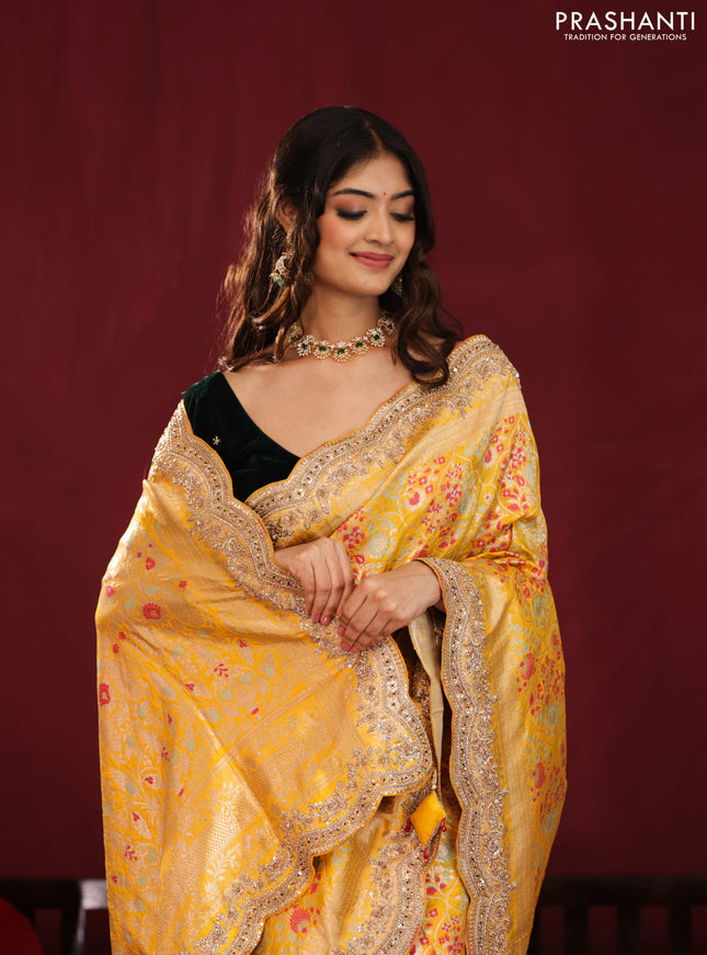 Yellow banarasi uppada silk saree with allover mina weaves & border embroidery