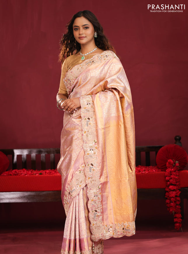 Pastel pink pure kanchipuram silk saree with brocade zari weaves & embroidery