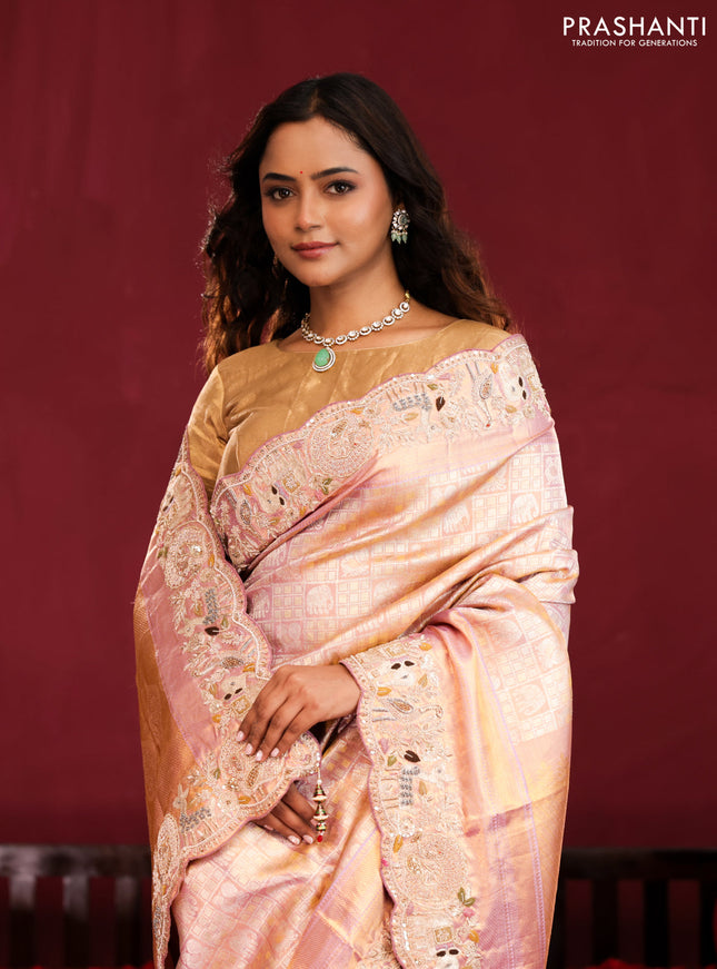 Pastel pink pure kanchipuram silk saree with brocade zari weaves & embroidery