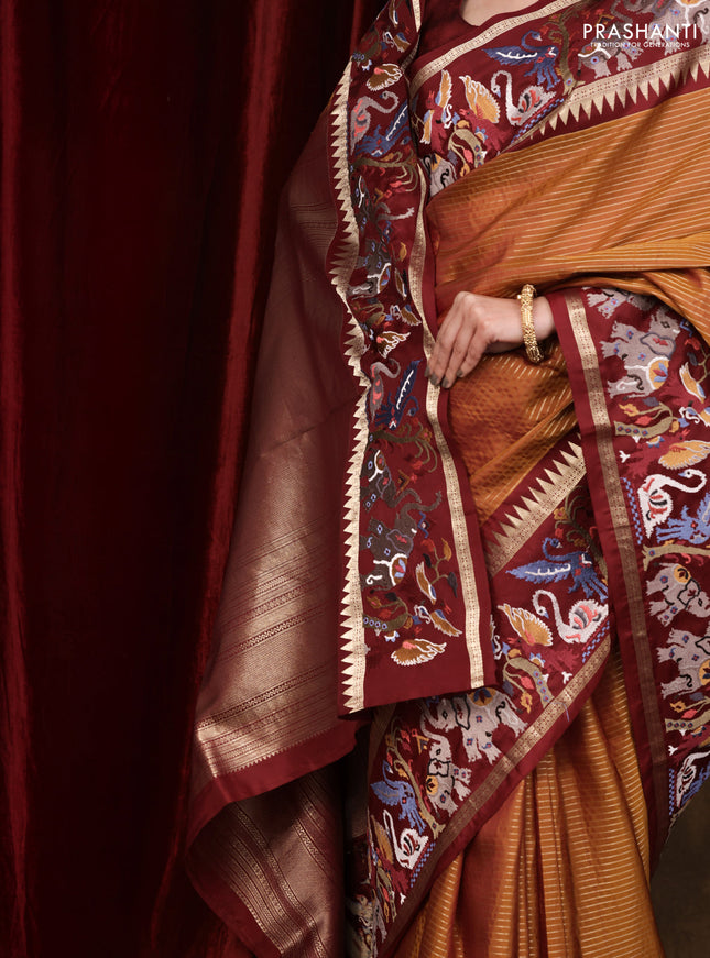 Dark mustard -Maroon Pure kanchipuram silk saree with Border Embroidery