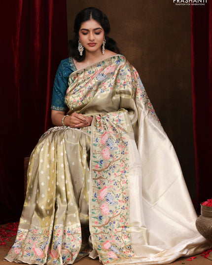 Elaichi Green Pure Kanchipuram Silk Saree With Silver Zari Buttas & Border Embroidery
